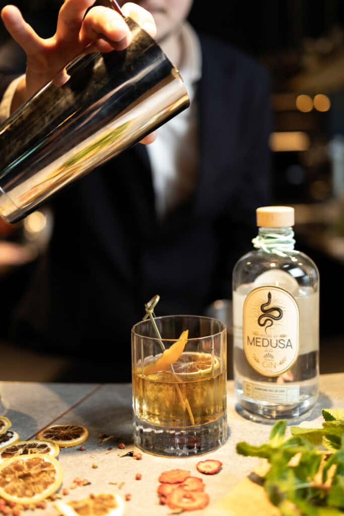 A Medusa gin-based cocktail being made at nox bar in voco™ Brussels City North